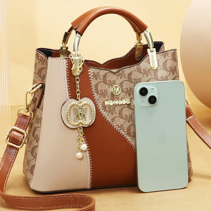 Stylová potištěná taška typu bucket bag