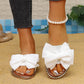 Dodejte svému letnímu outfitu třpytivý nádech – dámské mašličkové sandály s kamínky. Na dobírku! 👡