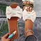 Dodejte svému letnímu outfitu třpytivý nádech – dámské mašličkové sandály s kamínky. Na dobírku! 👡