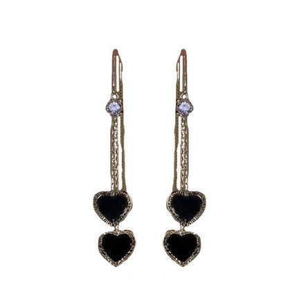 Prodlužte opticky krk a získejte elegantní siluetu – náušnice s dvousrdcovým designem. Na dobírku! 🖤