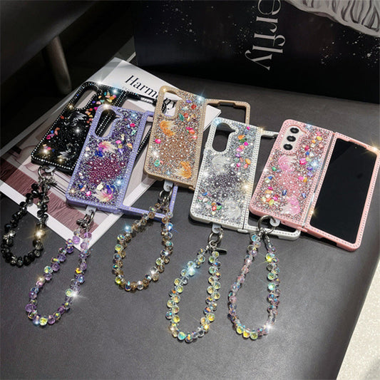 Zářte s elegantním zlatým designem – třpytivý telefonní kryt s řemínkem na zápěstí. Na dobírku! ✨