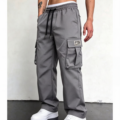 Praktické kapsy pro všechny vaše každodenní potřeby – pánské volné cargo kalhoty s mnoha úložnými prostory. Na dobírku! 👖